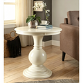 Table piédestal ronde en bois blanc vieilli
